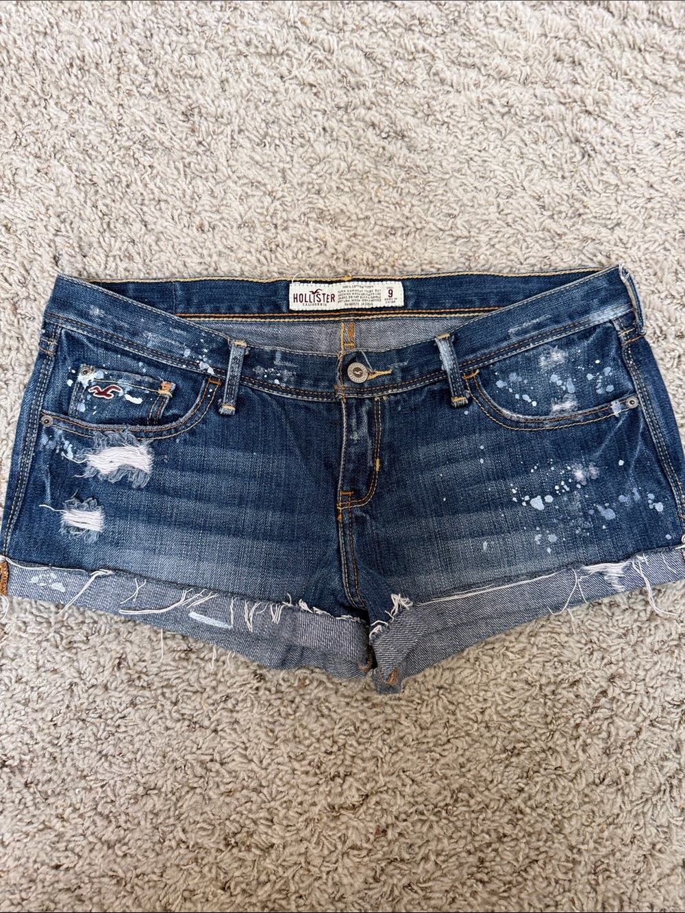 Hollister Women's Distressed Dark Denim Cutoff Shorts with Paint-Splash Detail